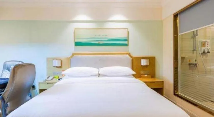 Bed in Vienna Hotel Guangdong Foshan Shunde Longjiang Material City