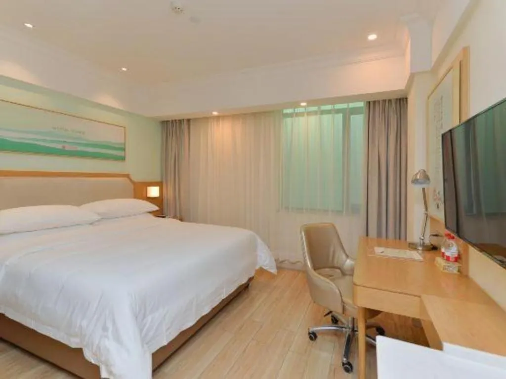 Bed in Vienna Hotel Guangdong Foshan Shunde Longjiang Material City