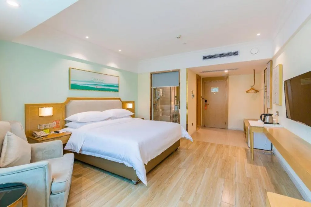 Bed in Vienna Hotel Guangdong Foshan Shunde Longjiang Material City