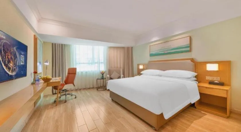 Bed in Vienna Hotel Guangdong Foshan Shunde Longjiang Material City