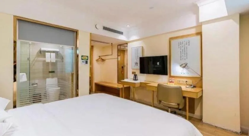 Bed in Vienna Hotel Guangdong Foshan Shunde Longjiang Material City