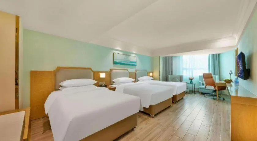 Bed in Vienna Hotel Guangdong Foshan Shunde Longjiang Material City