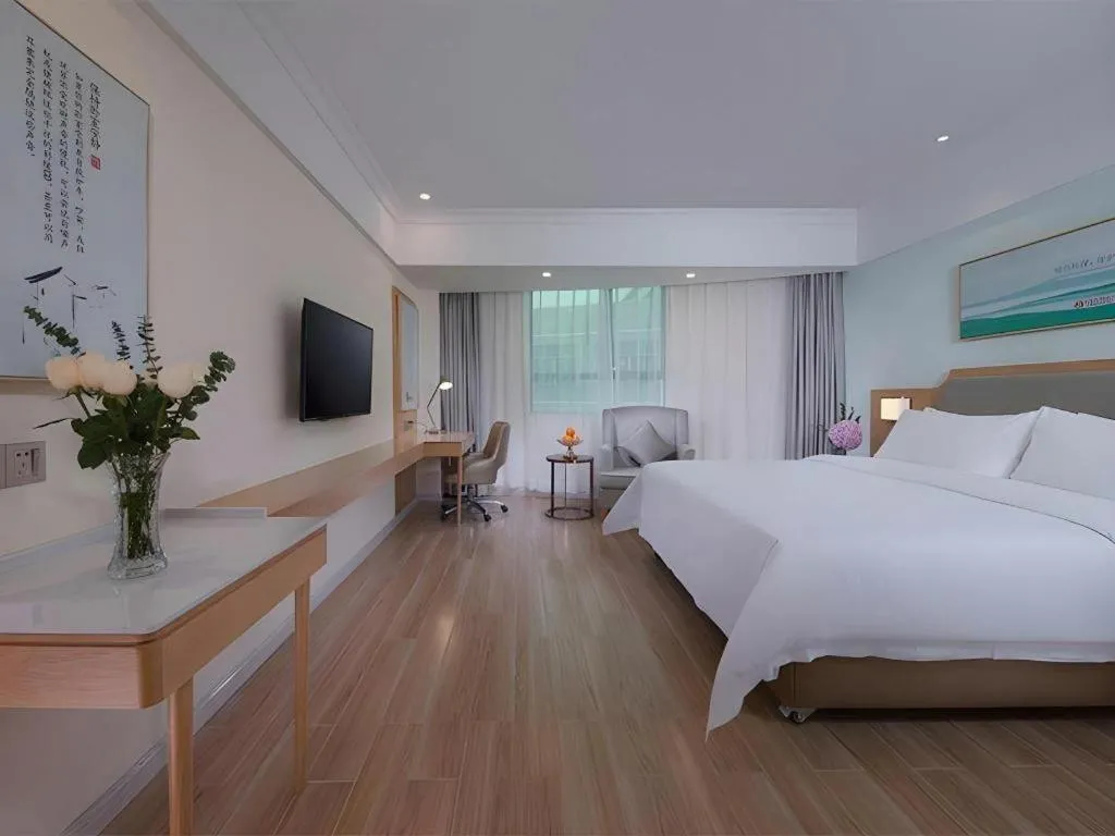 Bed in Vienna Hotel Guangdong Foshan Shunde Longjiang Material City