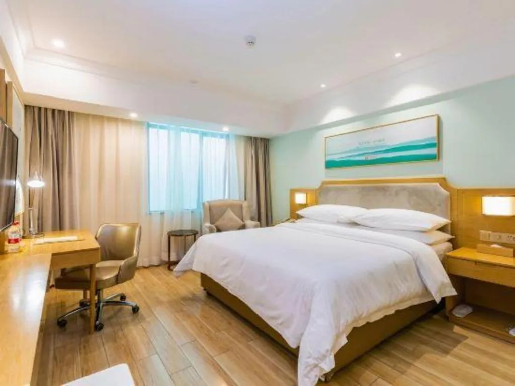 Bed in Vienna Hotel Guangdong Foshan Shunde Longjiang Material City