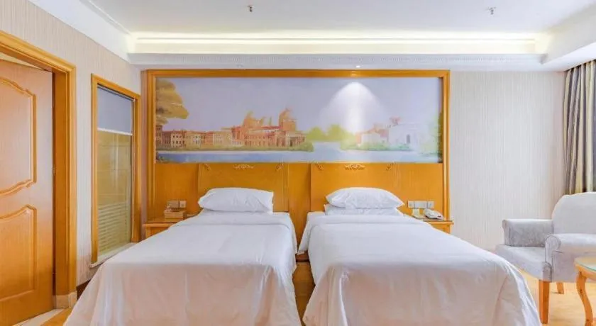 Bed in Vienna Hotel Anhui Bozhou Lixin Yuanli Plaza