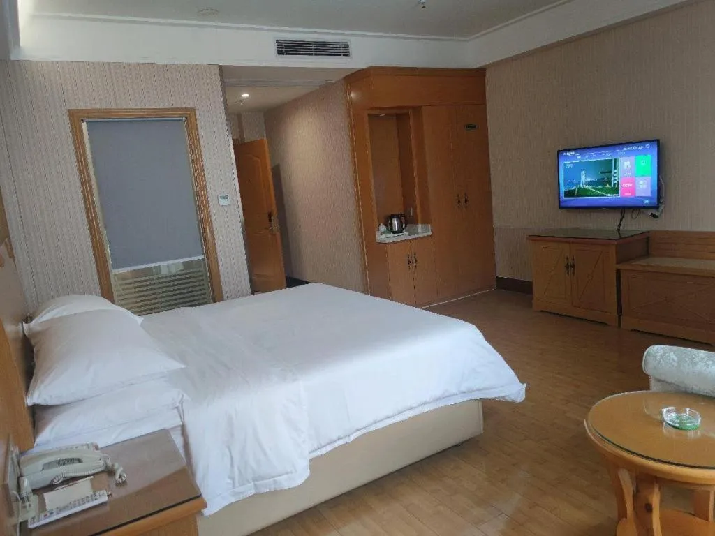 Bed in Vienna Hotel Anhui Bozhou Lixin Yuanli Plaza