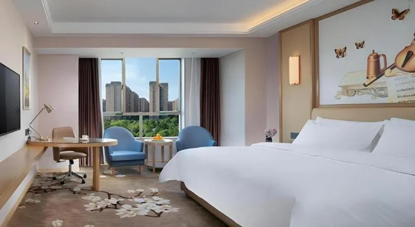 Bed in Vienna Hotel Guangdong Foshan West Station Airport Luocun