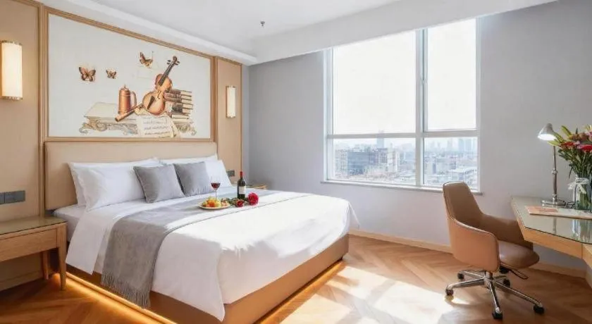 Bed in Vienna Hotel Guangdong Foshan West Station Airport Luocun