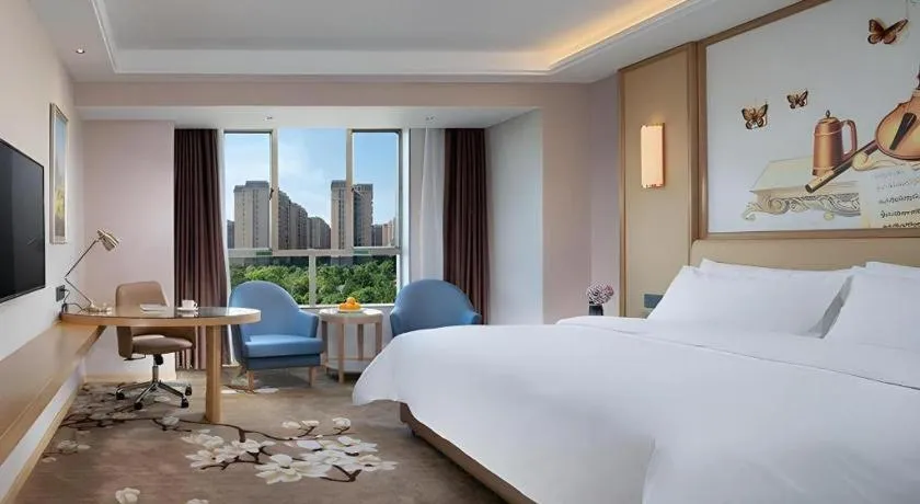 Bed in Vienna Hotel Guangdong Foshan West Station Airport Luocun
