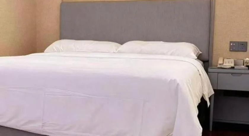 Bed in Vienna Hotel Guangdong Foshan West Station Airport Luocun
