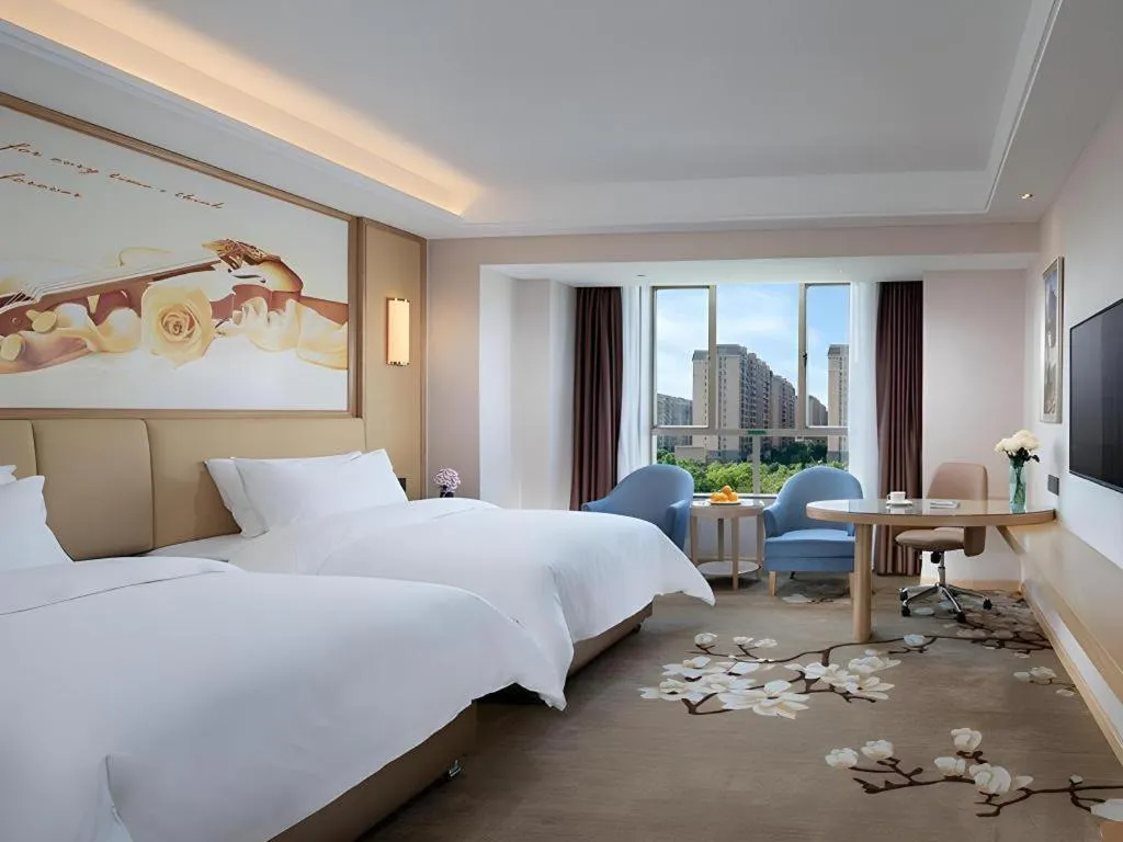 Bed in Vienna Hotel Guangdong Foshan West Station Airport Luocun