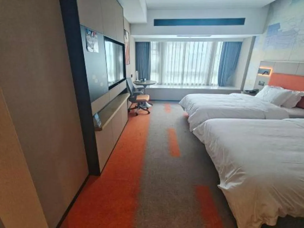 Bed in Vienna Hotel Guangdong Foshan West Station Airport Luocun