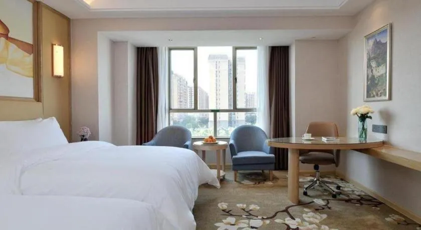 Bed in Vienna Hotel Guangdong Foshan West Station Airport Luocun