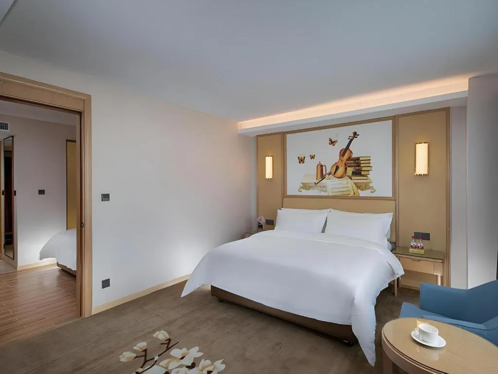 Bed in Vienna Hotel Guangdong Foshan West Station Airport Luocun