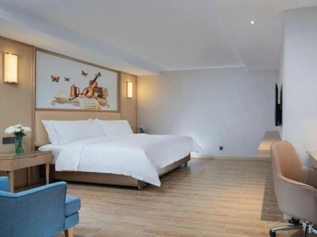 Bed in Vienna Hotel Guangdong Foshan West Station Airport Luocun