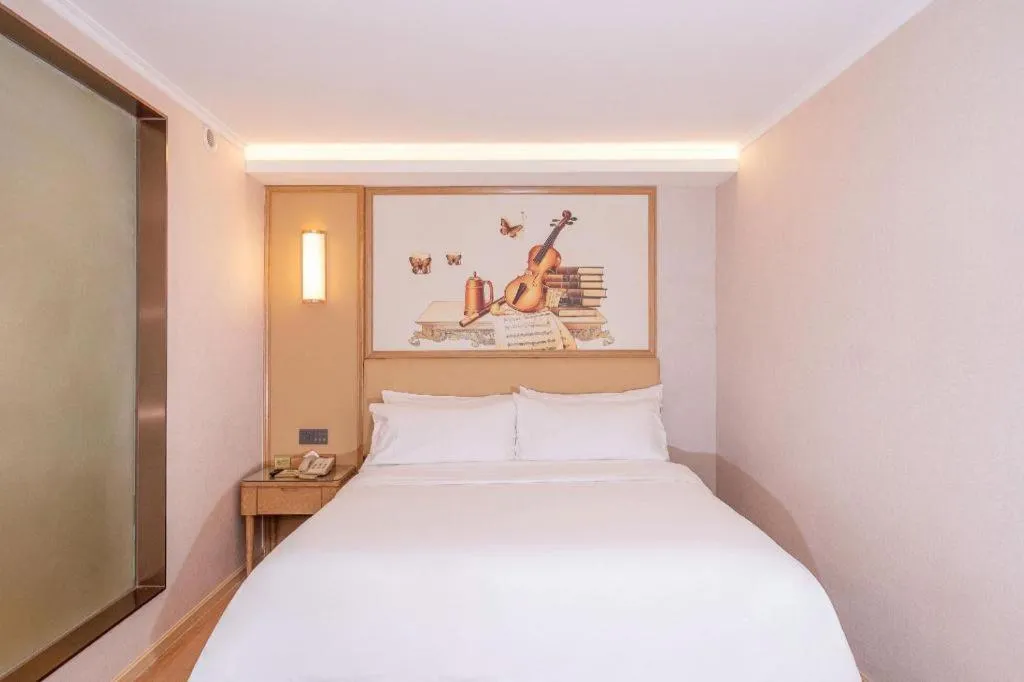 Bed in Vienna Hotel Guangdong Foshan West Station Airport Luocun