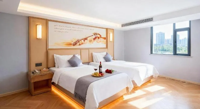 Bed in Vienna Hotel Guangdong Foshan West Station Airport Luocun
