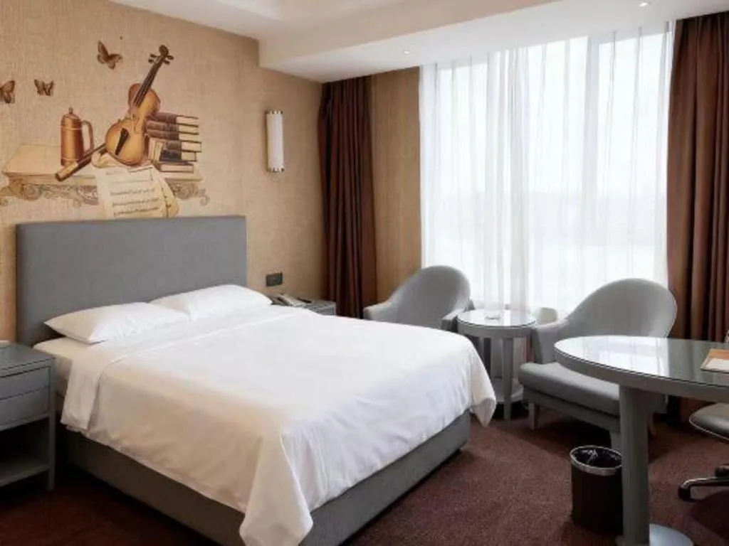 Bed in Vienna Hotel Guangdong Foshan West Station Airport Luocun