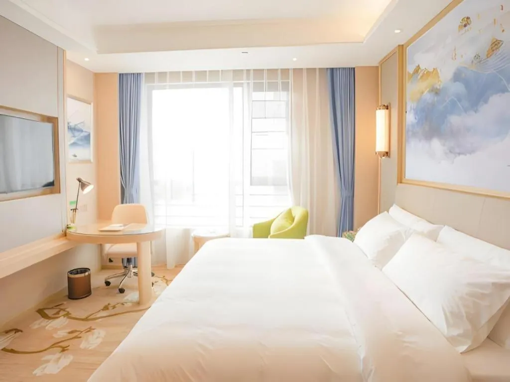 Bed in Vienna Hotel Yunnan Dali Erhai Lake