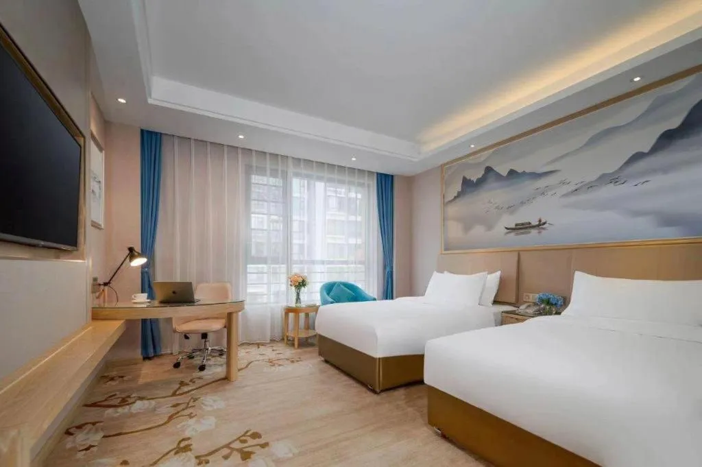 Bed in Vienna Hotel Yunnan Dali Erhai Lake