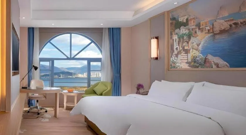 Bed in Vienna Hotel Yunnan Dali Erhai Lake