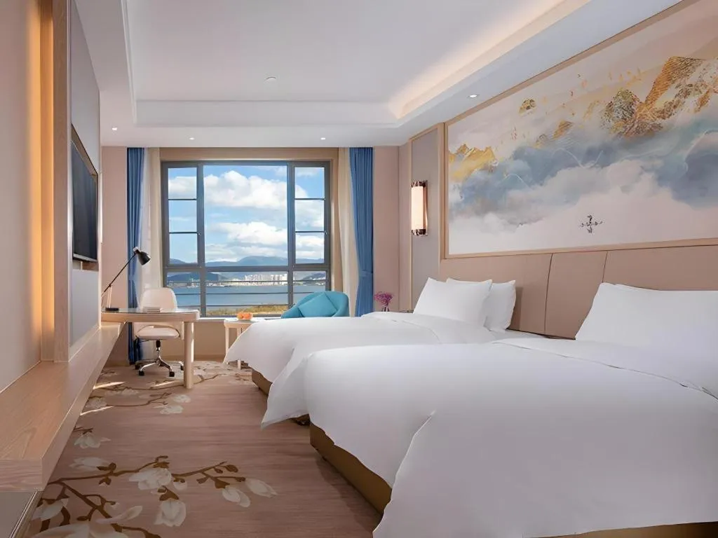 Bed in Vienna Hotel Yunnan Dali Erhai Lake