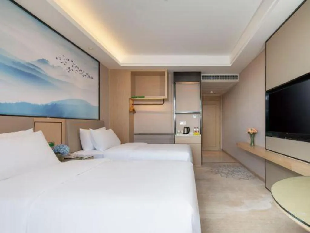 Bed in Vienna Hotel Yunnan Dali Erhai Lake