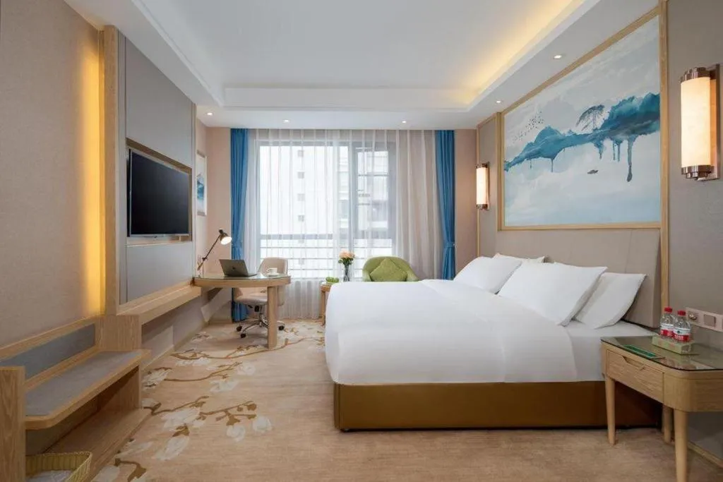 Bed in Vienna Hotel Yunnan Dali Erhai Lake