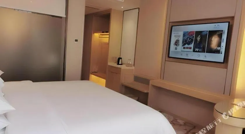 Bed in Vienna Hotel Yunnan Dali Erhai Lake