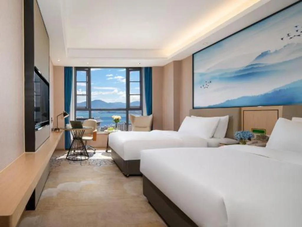 Bed in Vienna Hotel Yunnan Dali Erhai Lake