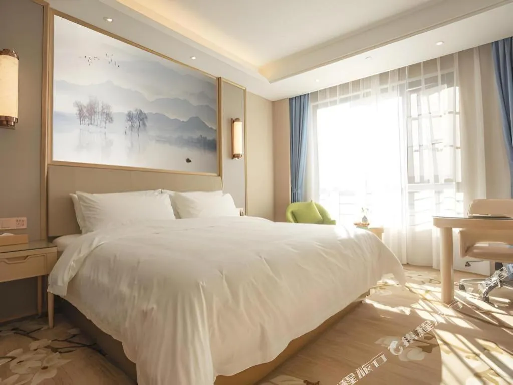 Bed in Vienna Hotel Yunnan Dali Erhai Lake