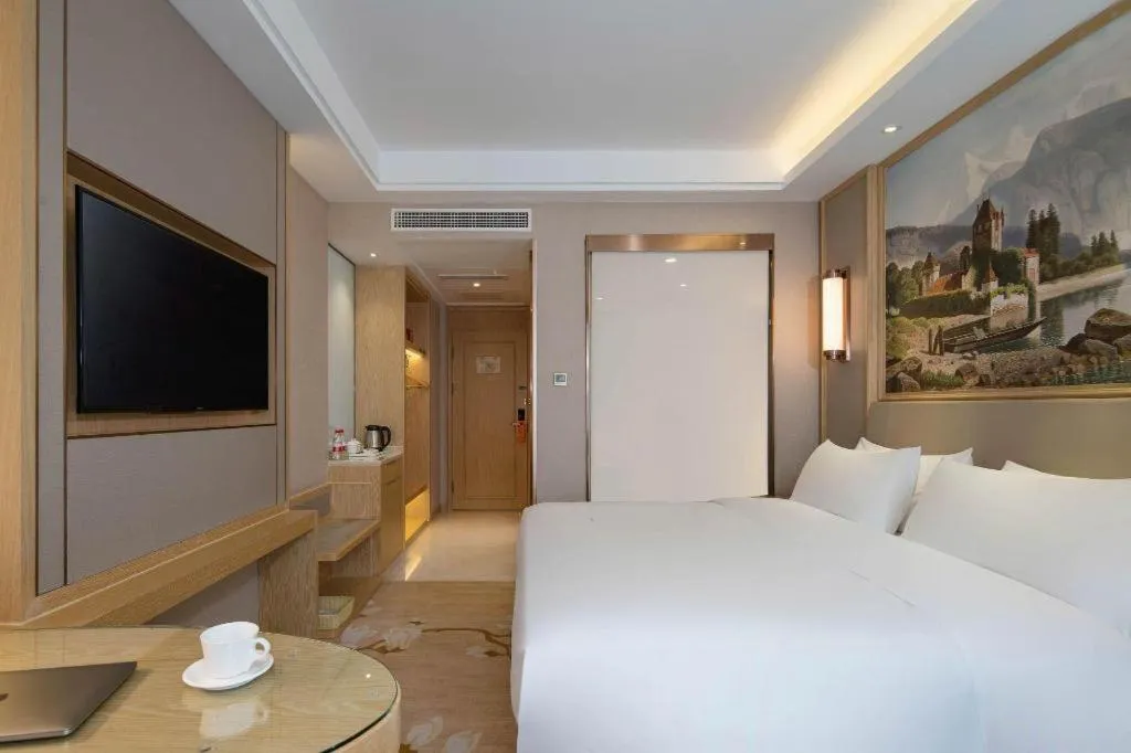 Bed in Vienna Hotel Yunnan Dali Erhai Lake