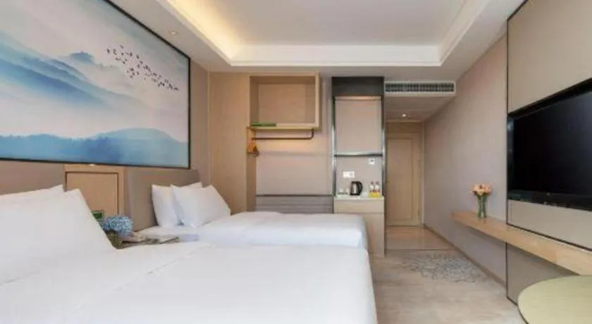 Bed in Vienna Hotel Yunnan Dali Erhai Lake