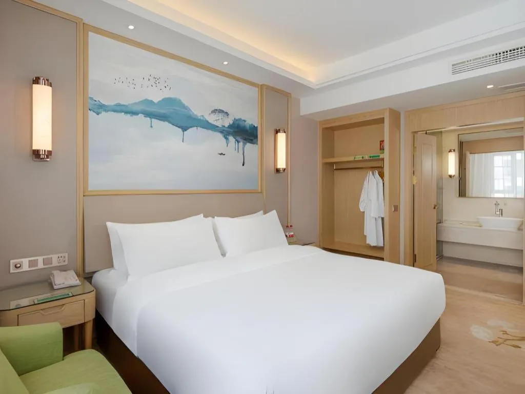 Bed in Vienna Hotel Yunnan Dali Erhai Lake