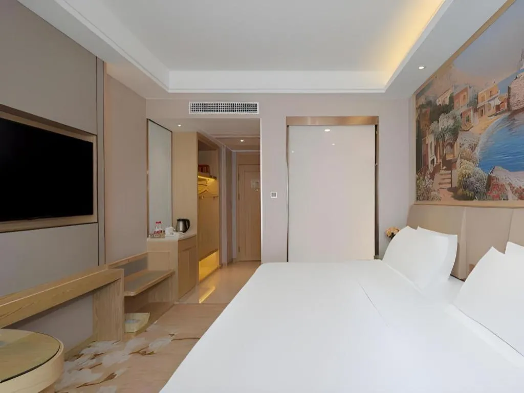 Bed in Vienna Hotel Yunnan Dali Erhai Lake