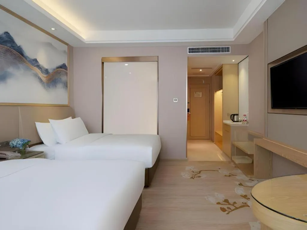 Bed in Vienna Hotel Yunnan Dali Erhai Lake