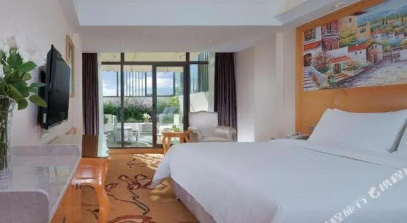 Bed in Vienna Hotel Kunming Beijing Road Chuanxin Gulou Metro Station