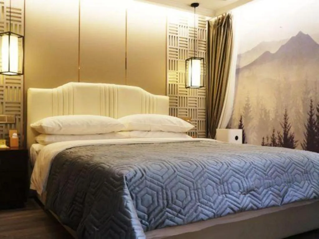 Bed in Vienna Hotel Kunming Beijing Road Chuanxin Gulou Metro Station