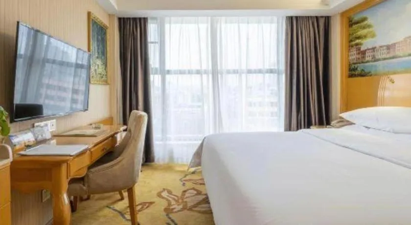 Bed in Vienna Hotel Kunming Beijing Road Chuanxin Gulou Metro Station