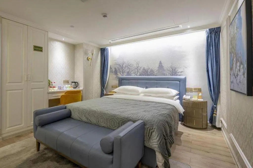 Bed in Vienna Hotel Kunming Beijing Road Chuanxin Gulou Metro Station