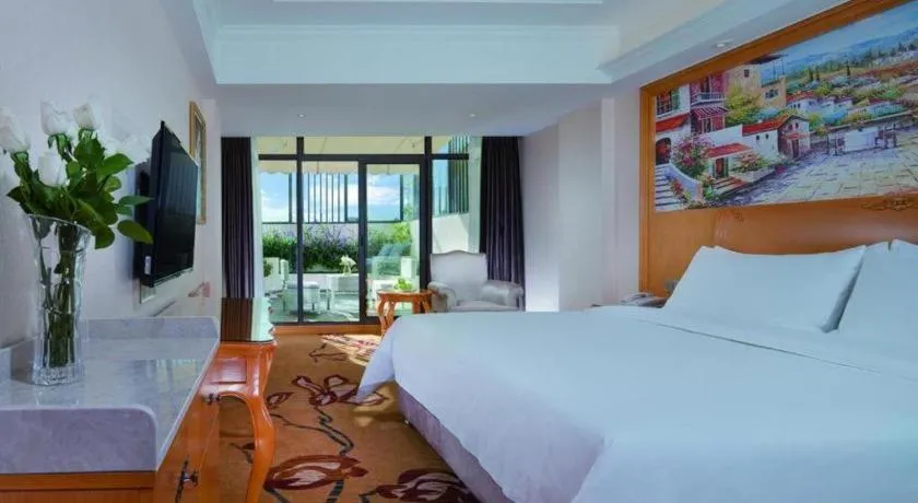 Bed in Vienna Hotel Kunming Beijing Road Chuanxin Gulou Metro Station