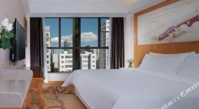 Bed in Vienna Hotel Kunming Beijing Road Chuanxin Gulou Metro Station