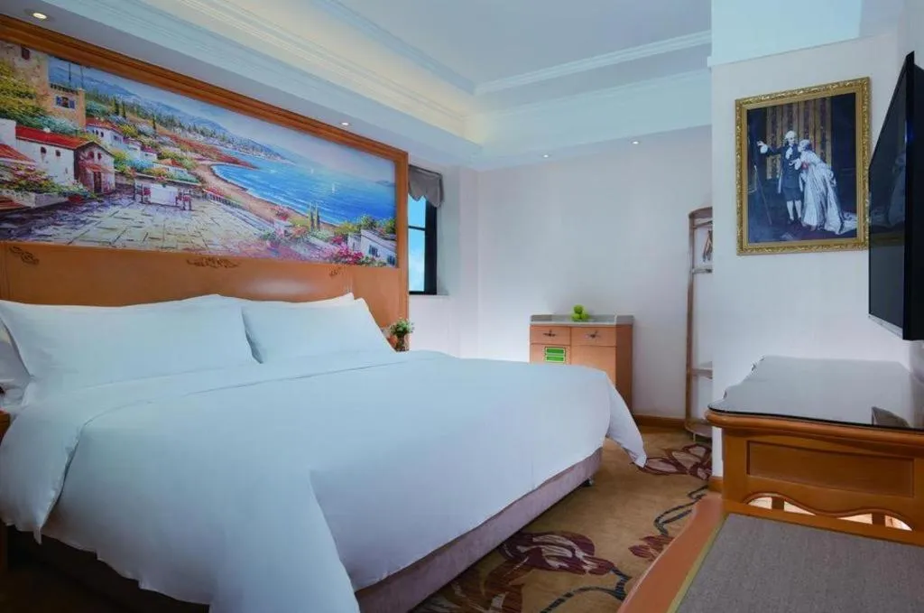 Bed in Vienna Hotel Kunming Beijing Road Chuanxin Gulou Metro Station