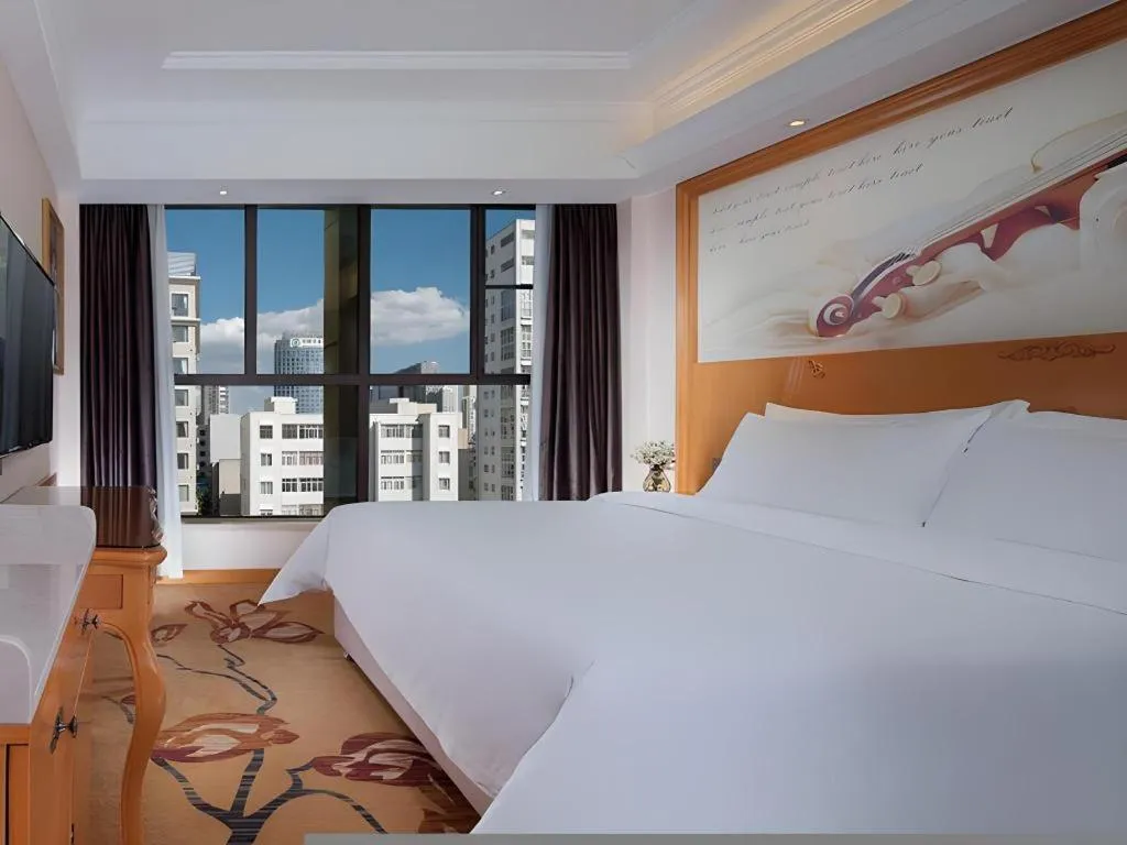 Bed in Vienna Hotel Kunming Beijing Road Chuanxin Gulou Metro Station