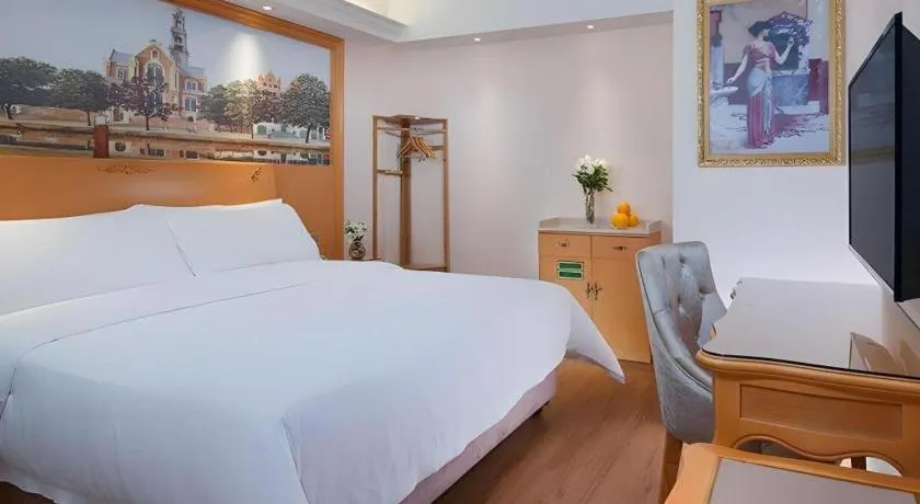 Bed in Vienna Hotel Kunming Beijing Road Chuanxin Gulou Metro Station