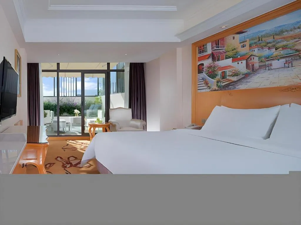 Bed in Vienna Hotel Kunming Beijing Road Chuanxin Gulou Metro Station