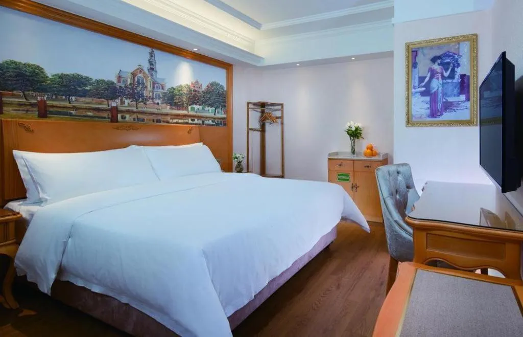 Bed in Vienna Hotel Kunming Beijing Road Chuanxin Gulou Metro Station