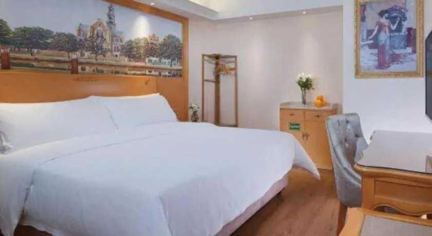 Bed in Vienna Hotel Kunming Beijing Road Chuanxin Gulou Metro Station