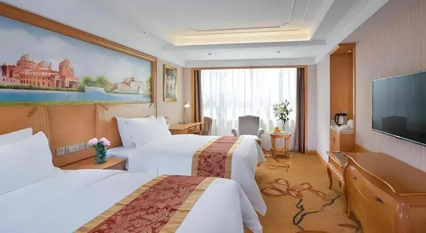 Bed in Vienna Hotel Ganzhou Economic Development Zone 1st Hospital West High-Speed Railway Station Bed in Vienna Hotel Ganzhou Economic Development Zone 1st Hospital West High-Speed Railway Station