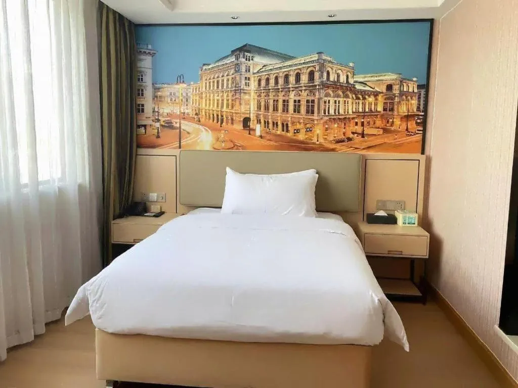 Bed in Vienna Hotel Ganzhou Economic Development Zone 1st Hospital West High-Speed Railway Station
